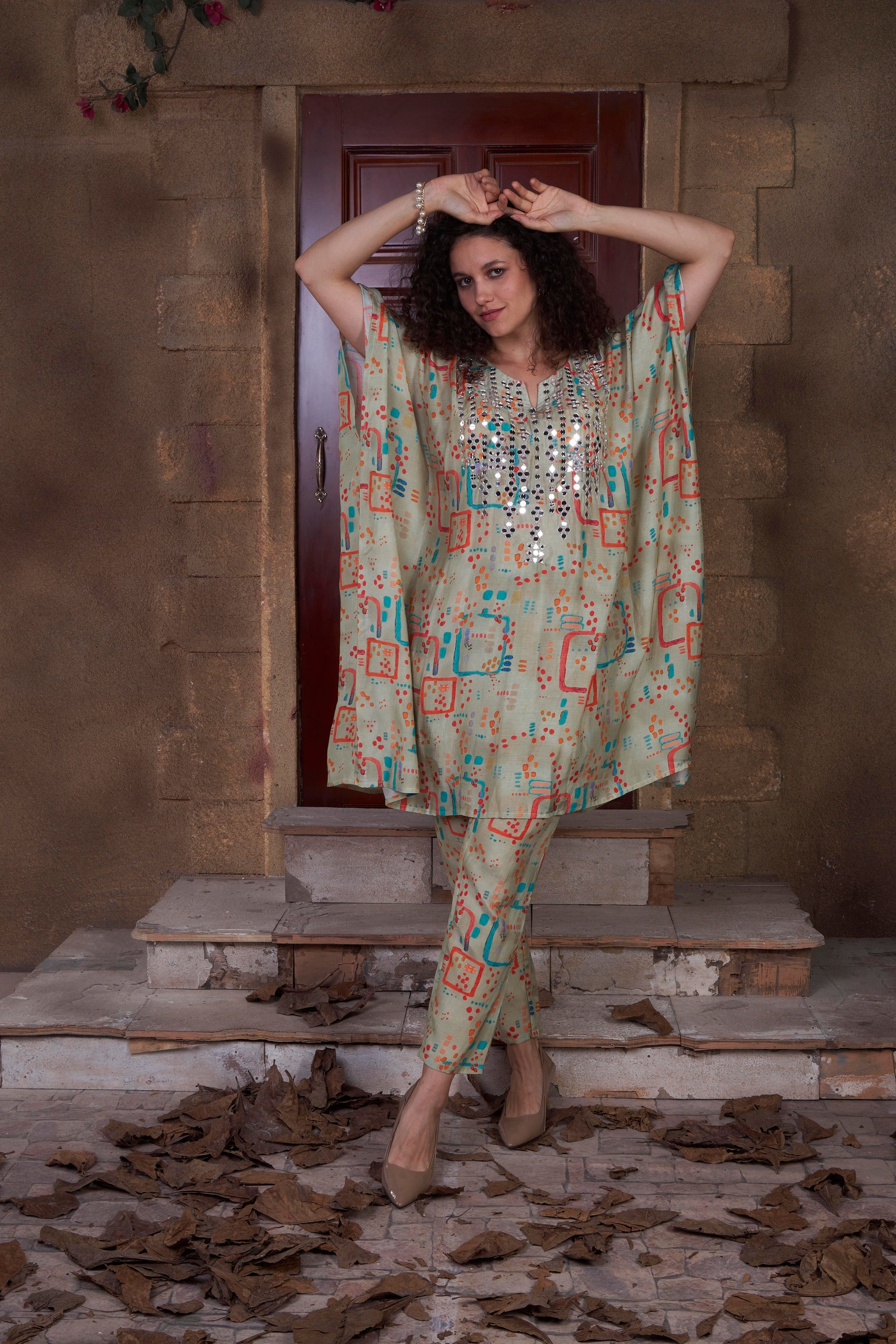 Pistachio green digital print kaftan style kurta with mirror work and straight pants