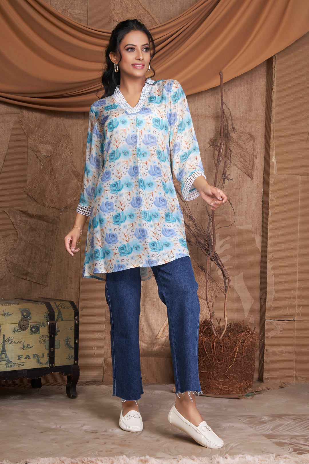 Blue Viscose digital print kurti with pearl and stone work on neck and sleeve