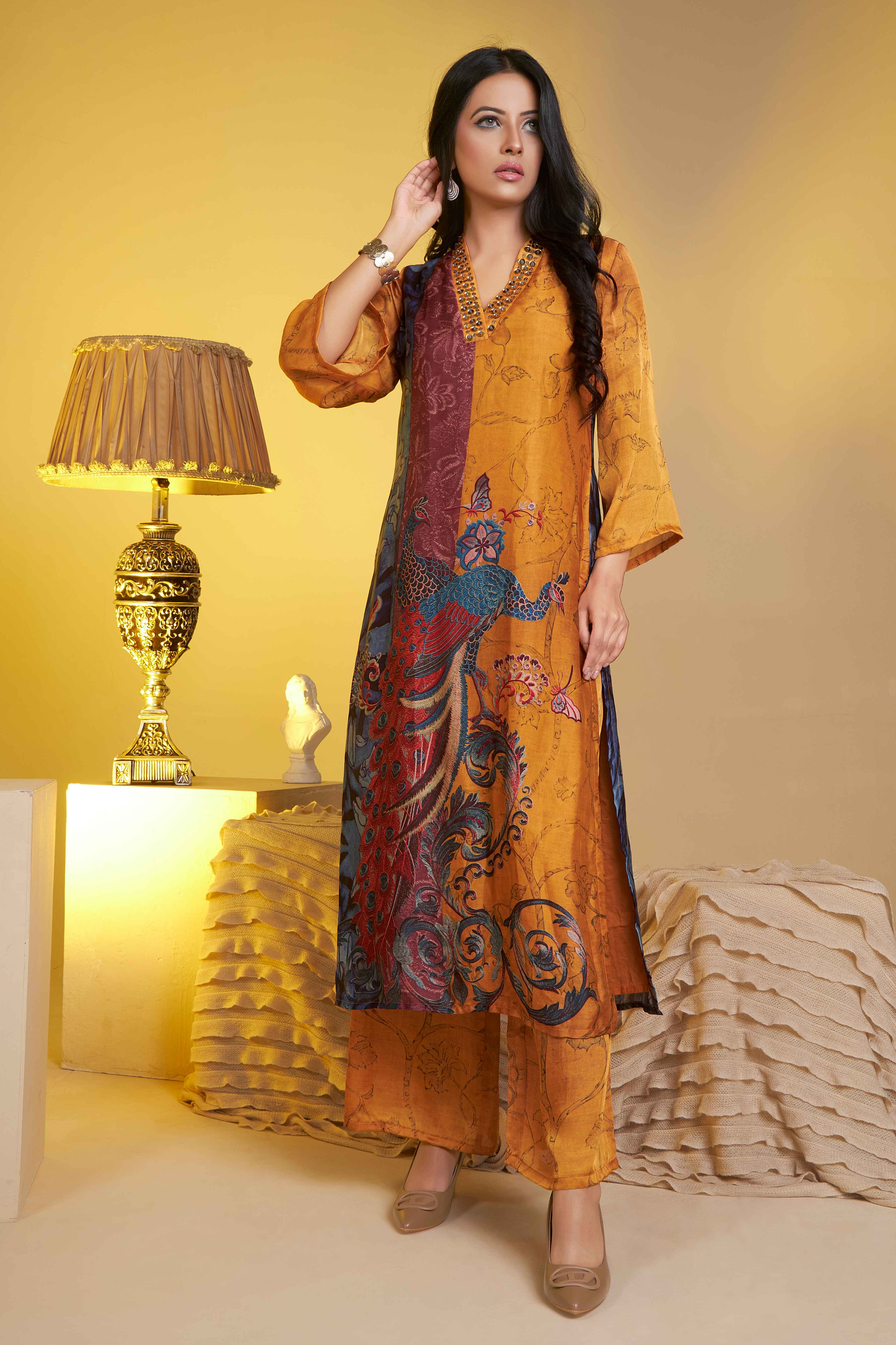 Mustard yellow with peacock placement print kurta palazzo set with hand embroidery on the neck