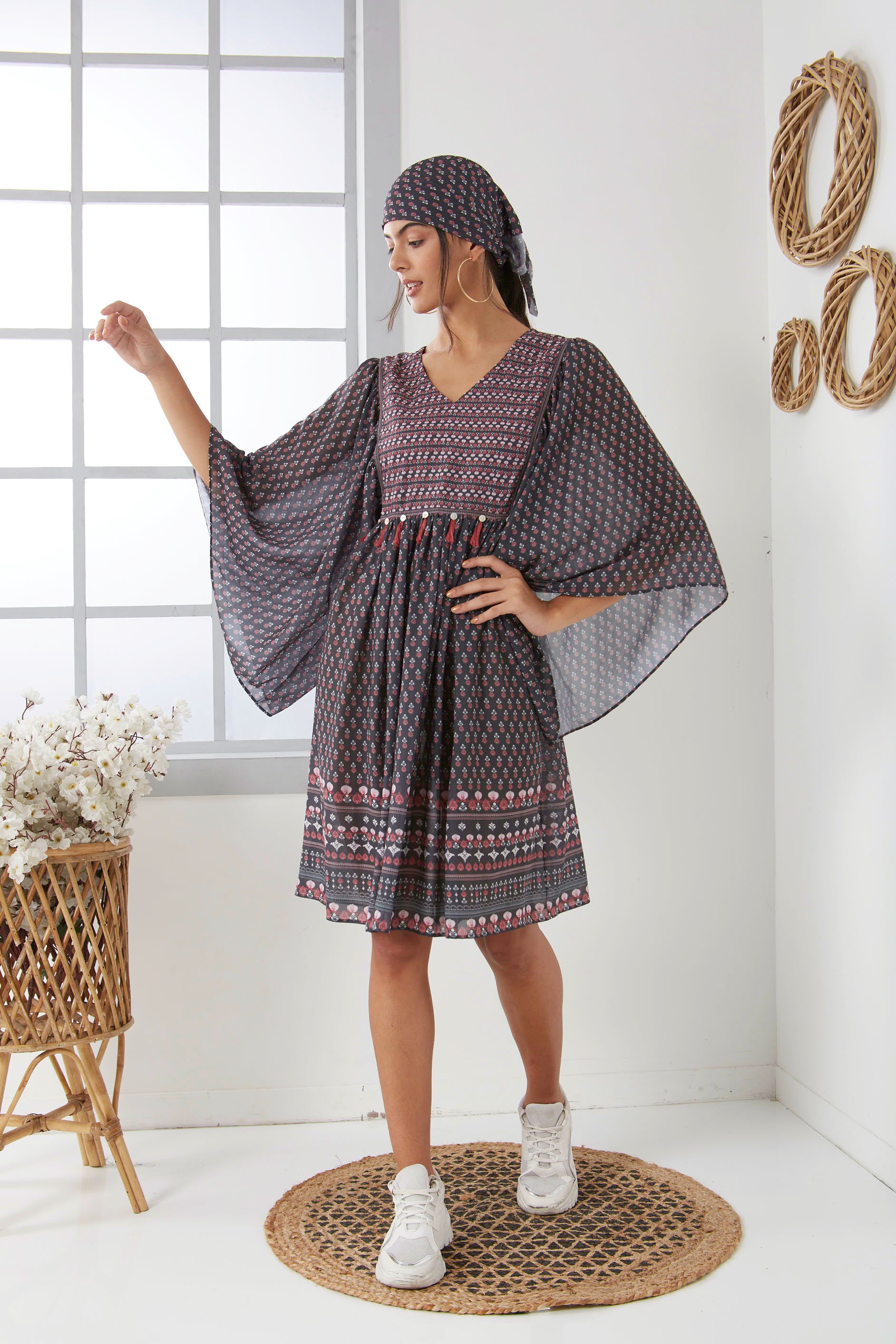 Black printed boho dress with tassel on yoke